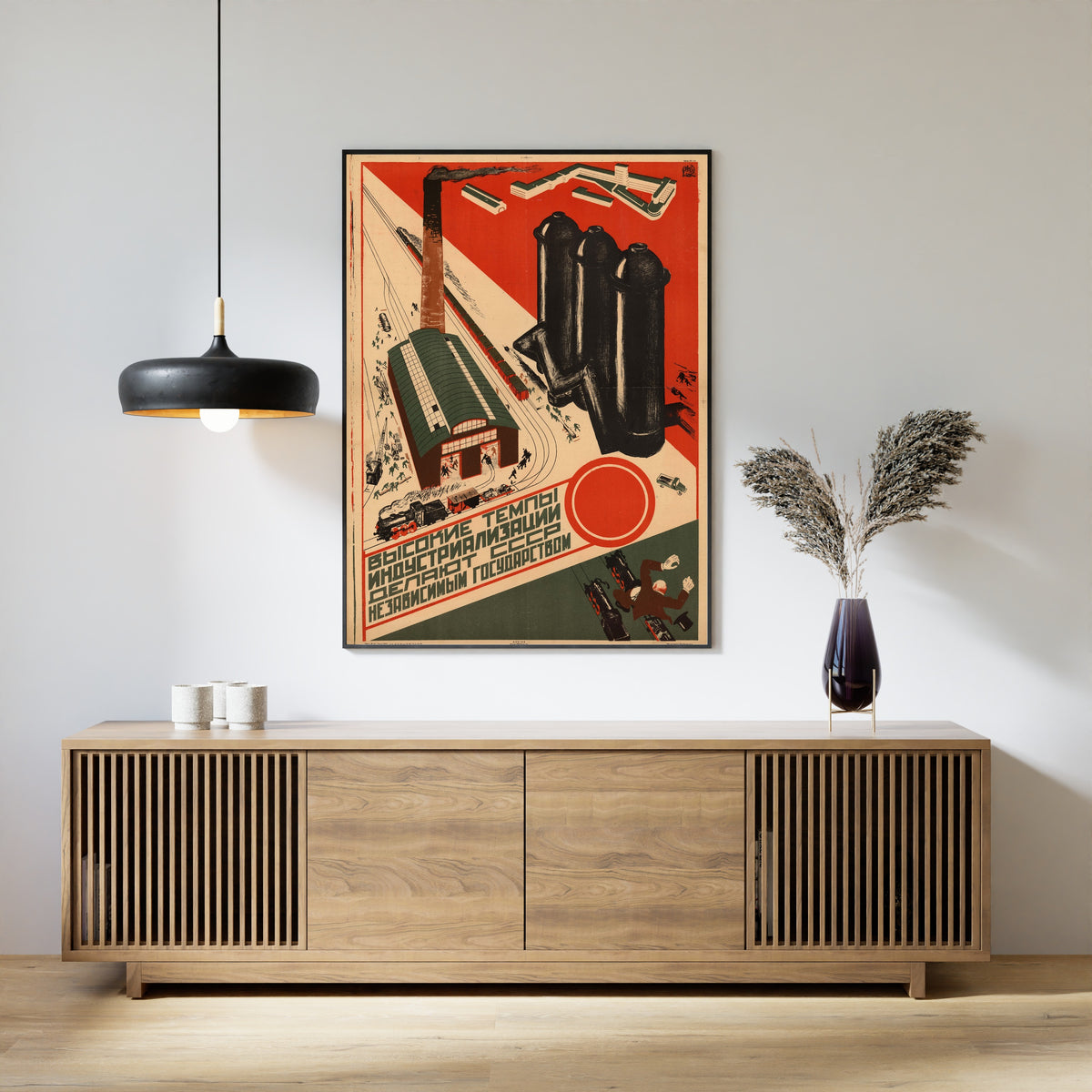 Framed art print of The High Pace of Industrialisation Makes the USSR an Independent State, above a slatted wood sideboard