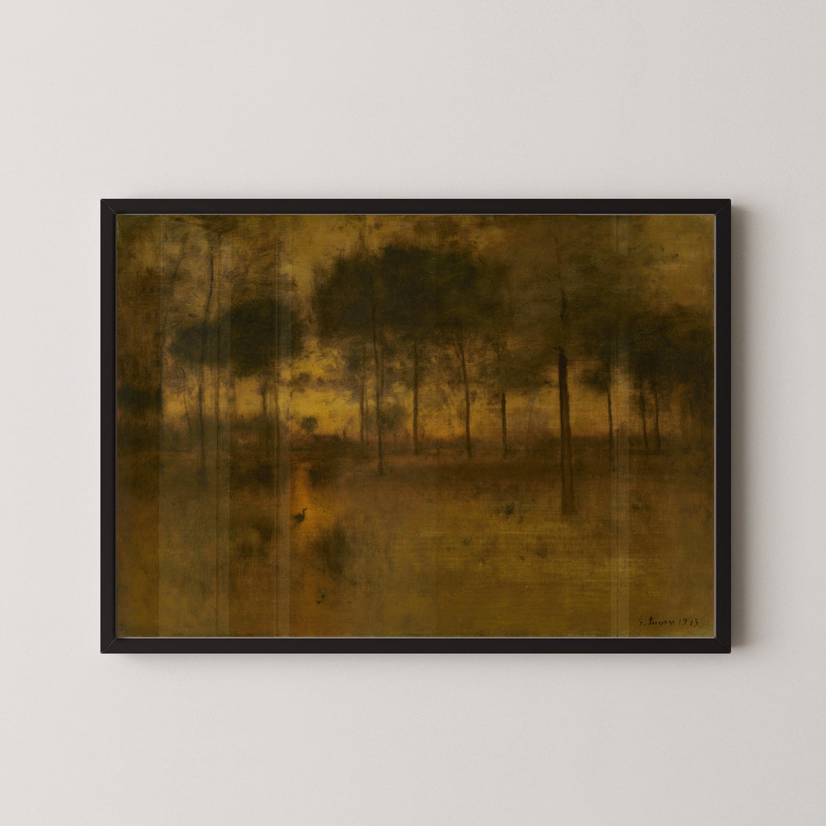 The Home of the Heron by George Inness — in a black frame on a pale wall