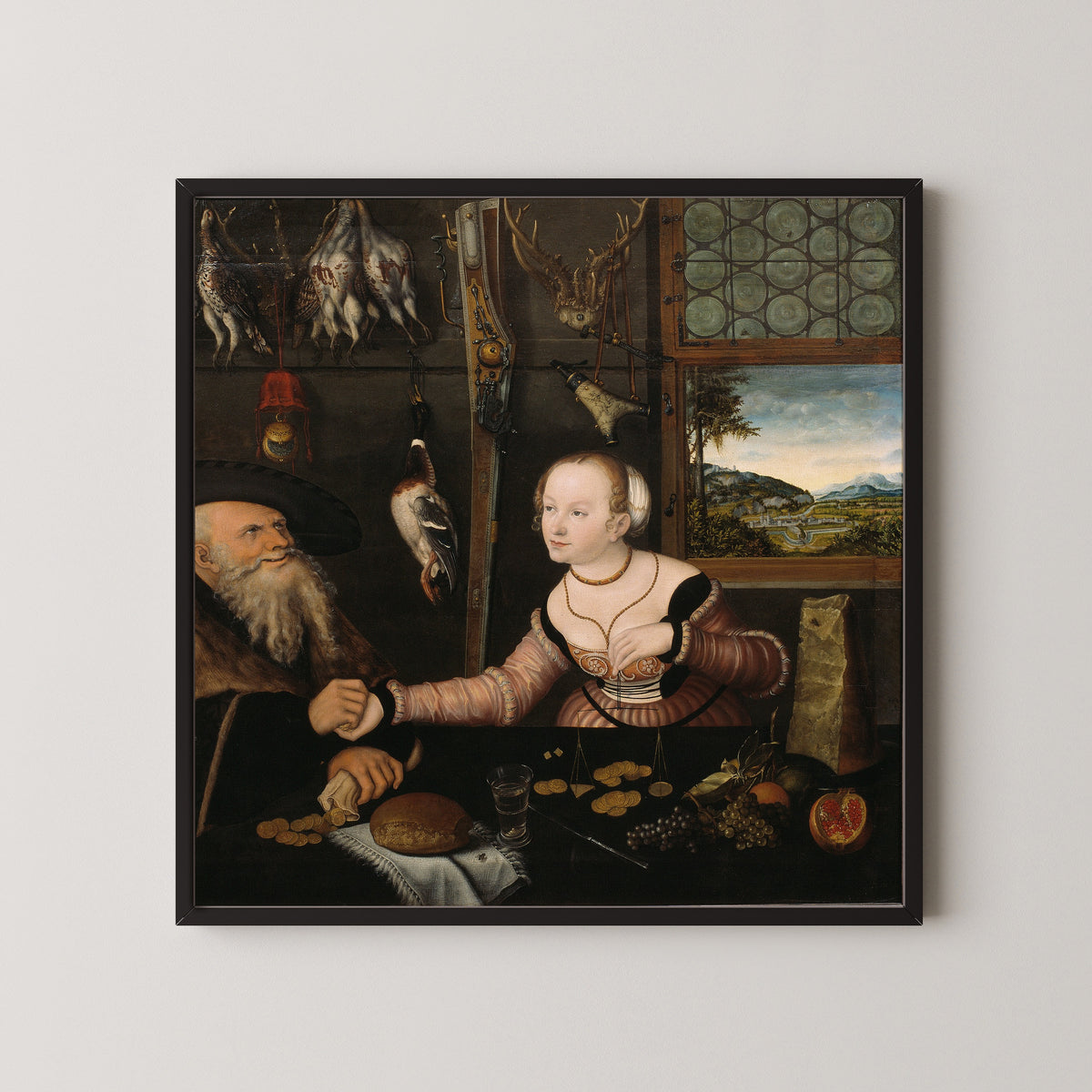 Framed art print of The Ill-matched Couple by Lucas Cranach the Elder, in a black frame on a pale wall