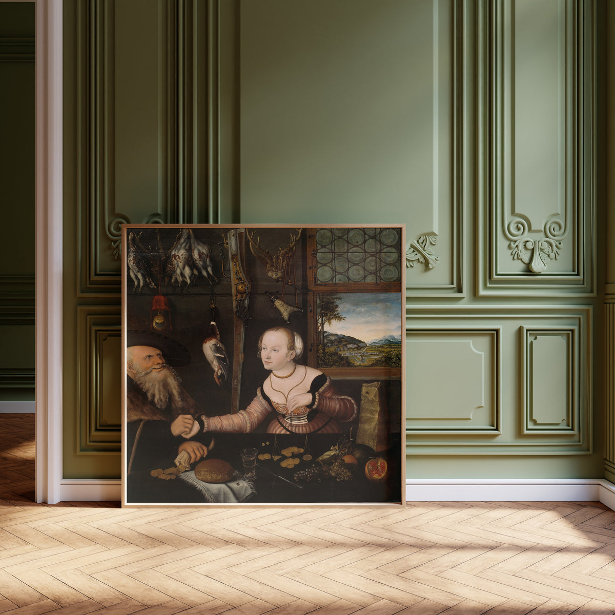 Framed art print of The Ill-matched Couple by Lucas Cranach the Elder, leaning against olive-green panelling on a herringbone floor