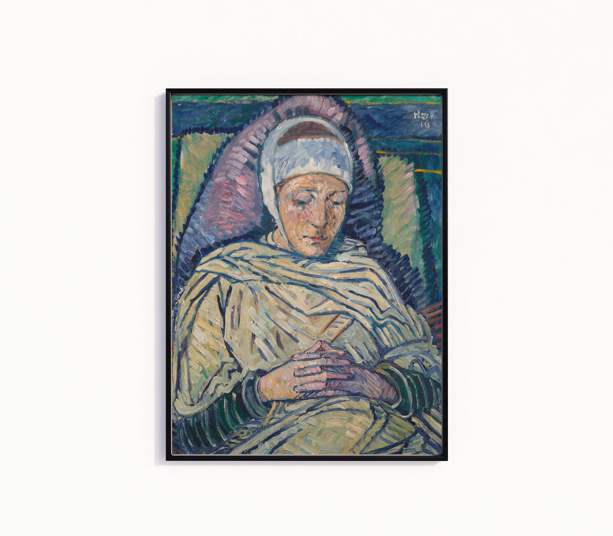 Framed art print of The Invalid by Heinrich Vogeler, in a slim black frame on a plain white wall