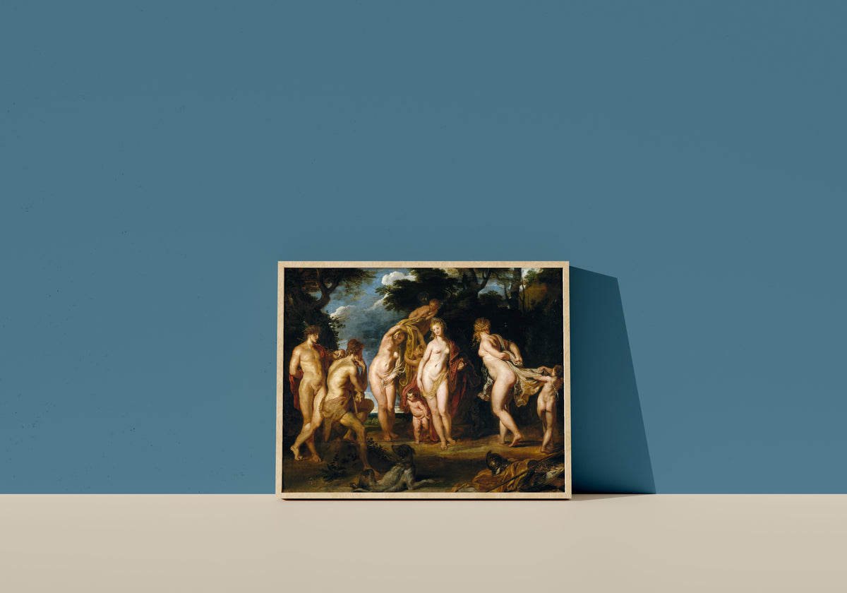 Framed art print of The Judgement of Paris by Peter Paul Rubens, in a light wood frame leaning on a blue wall