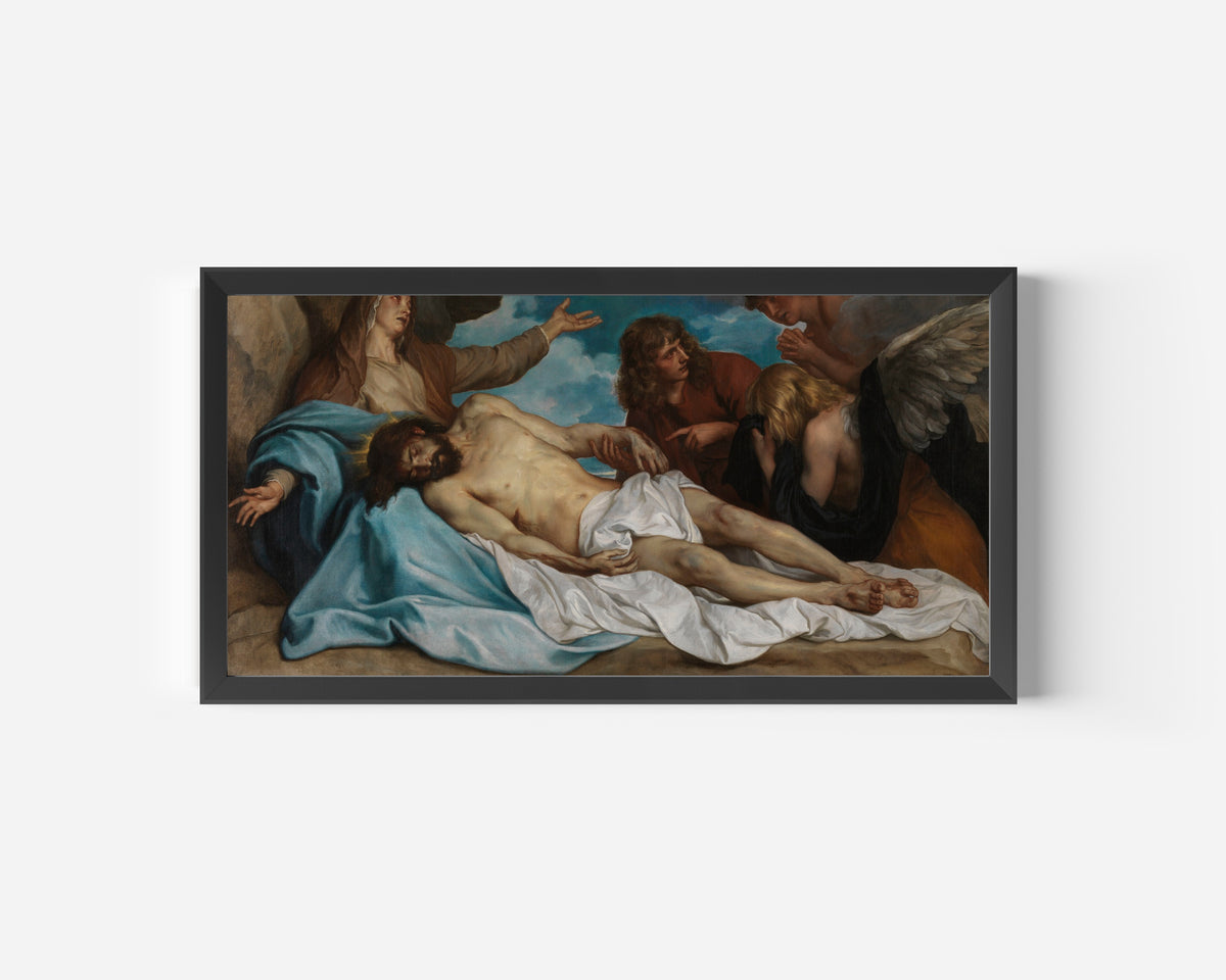 Framed art print of The Lamentation over the Dead Christ by Anthony van Dyck, in a wide black frame on a plain white wall