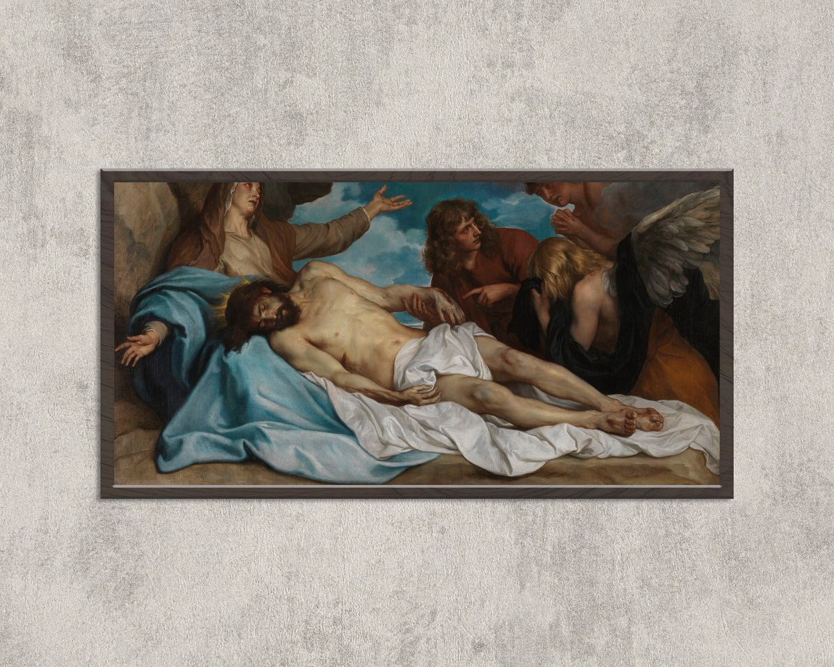 Framed art print of The Lamentation over the Dead Christ by Anthony van Dyck, in a wide black frame on a concrete wall