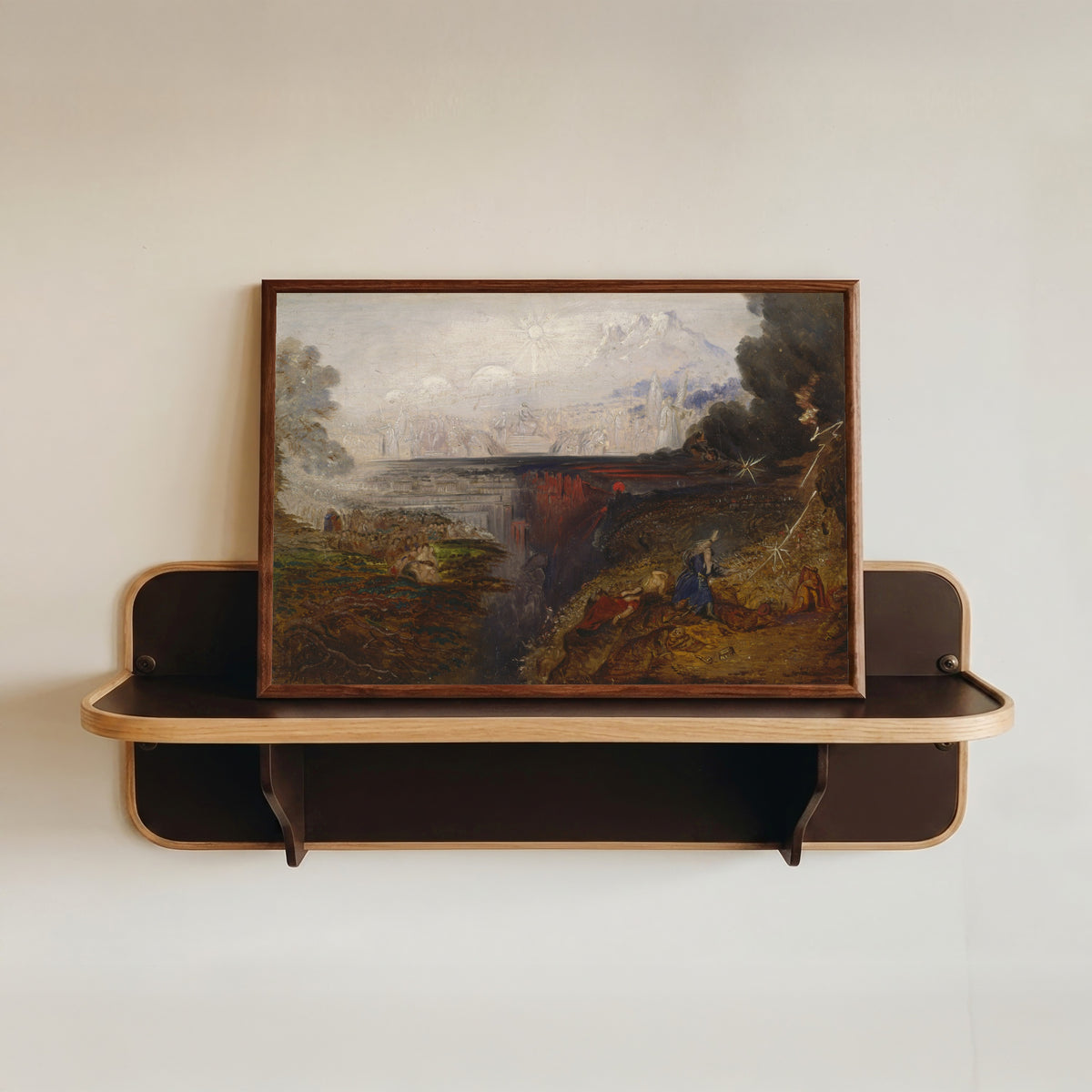 Framed art print of The Last Judgement (study) by John Martin, in a dark wood frame resting on a wall shelf