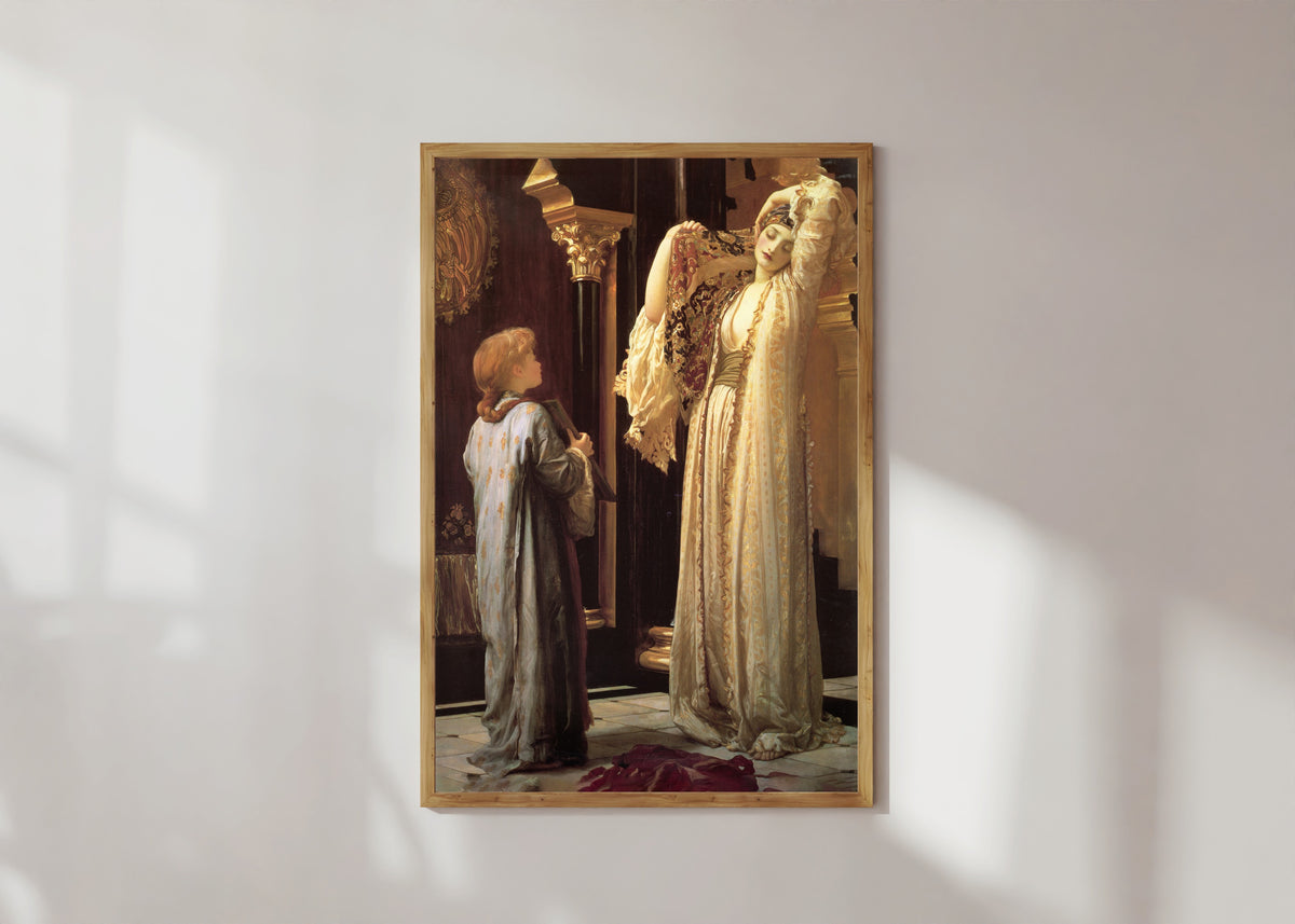 Framed art print of The Light of the Harem by Frederic Leighton, in a light wood frame on a sunlit white wall