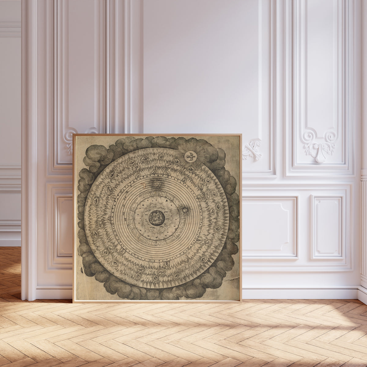 Framed art print of The Macrocosm: Concentric Spheres in Clouds (Utriusque Cosmi… by Robert Fludd, leaning against pale pink panelling on a herringbone floor