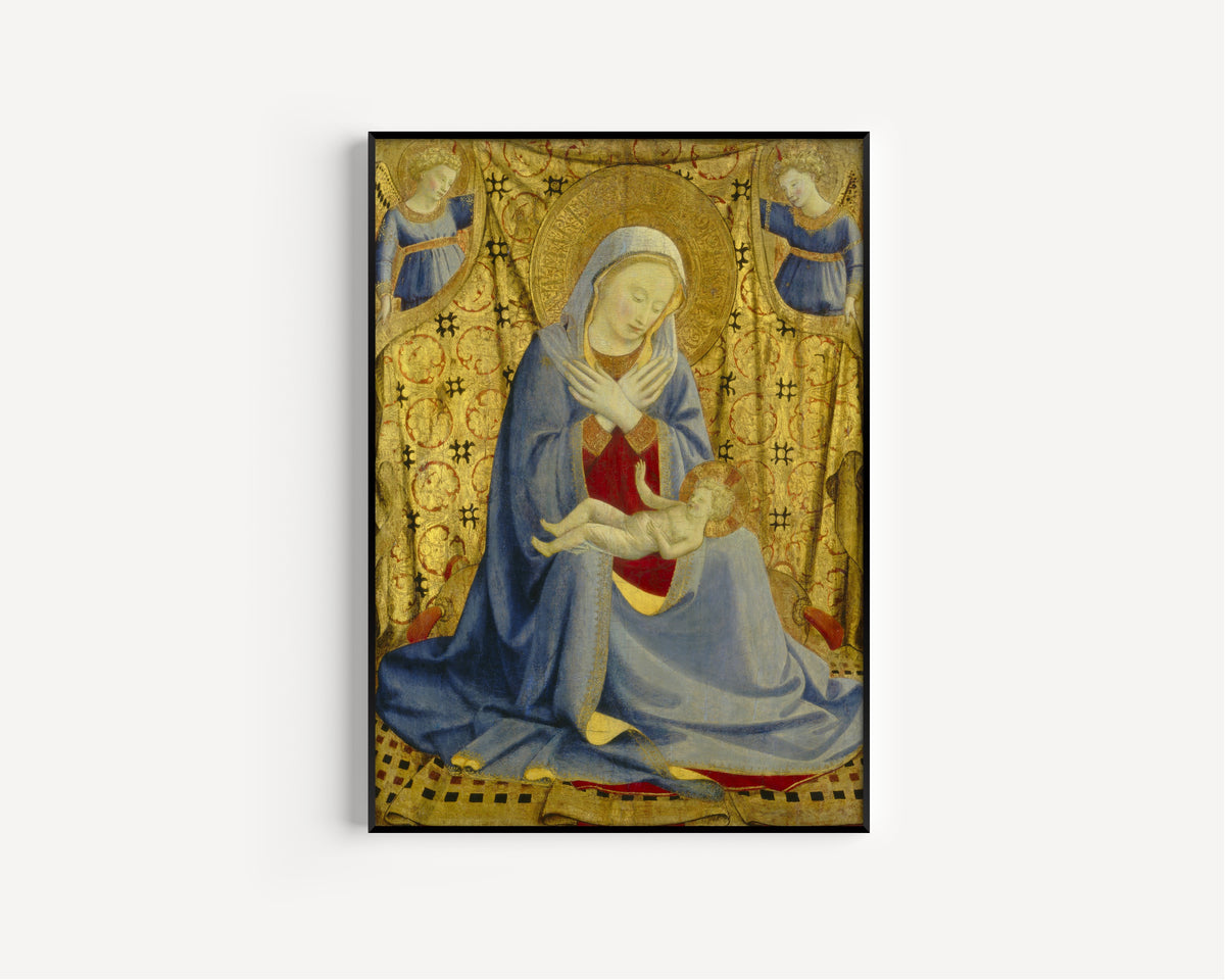 Framed art print of The Madonna of Humility by Fra Angelico, in a slim black frame on a plain white wall
