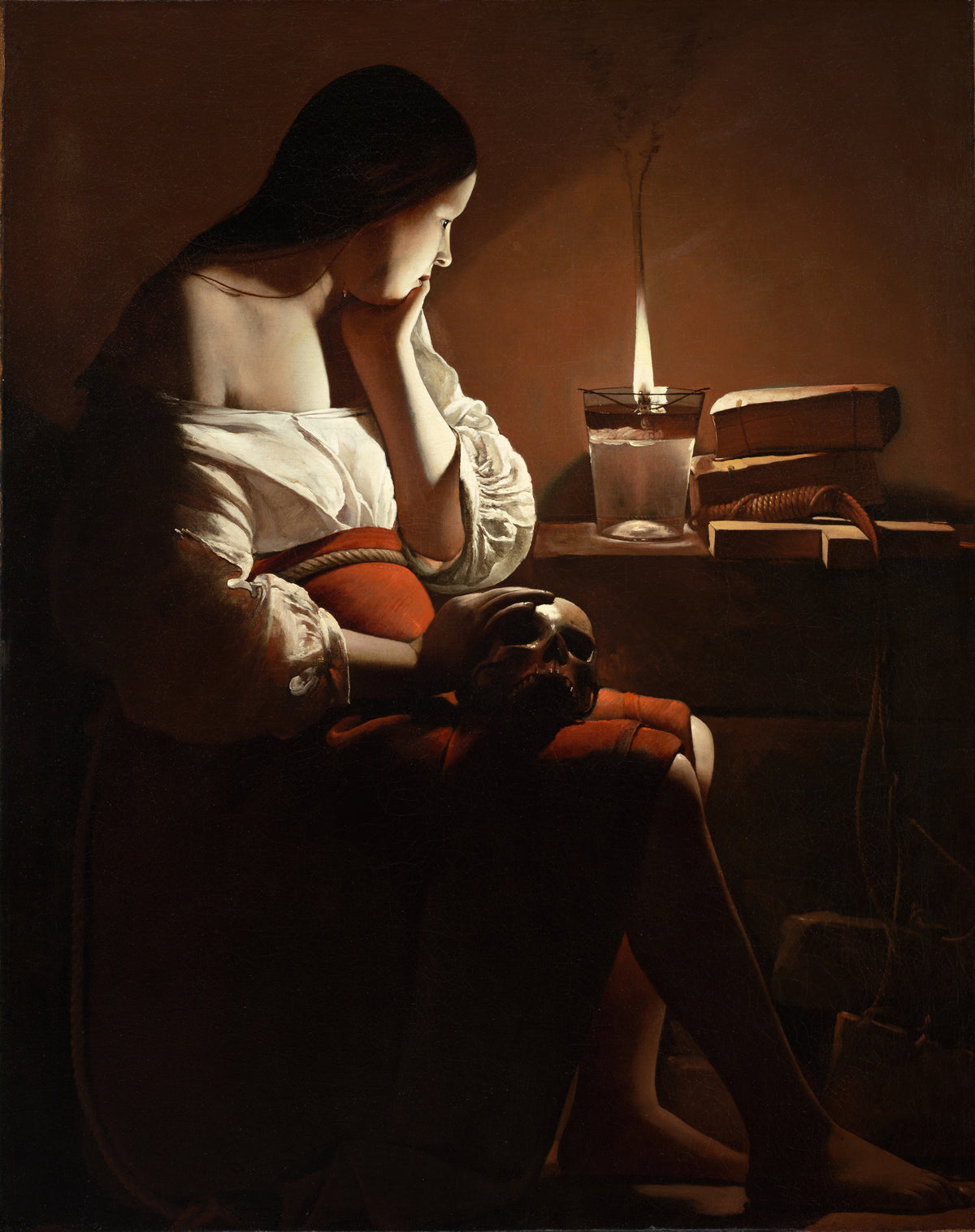 The Magdalen with the Smoking Flame by Georges de La Tour — A woman rests her chin on her hand beside a candle flame