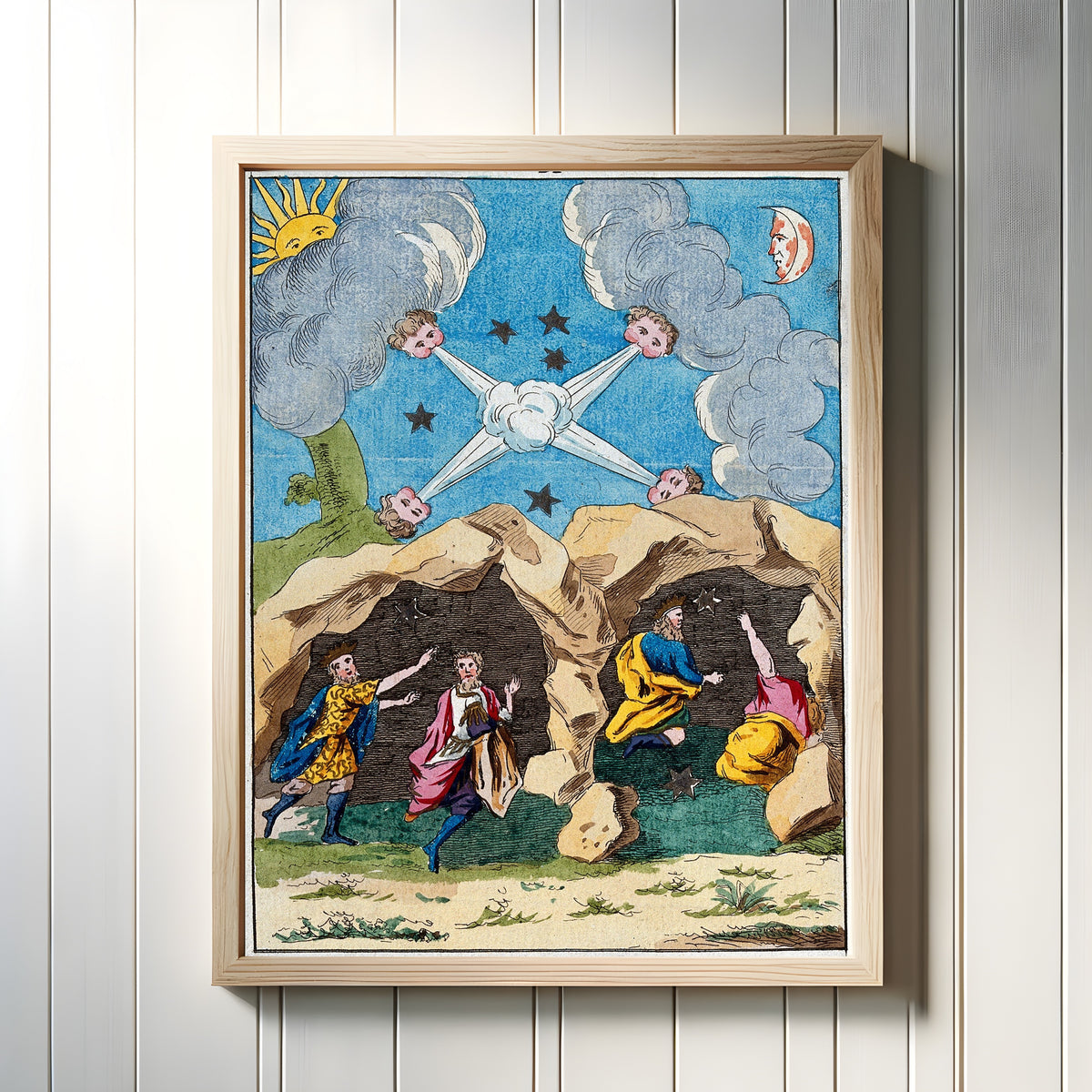 Framed art print of The Magi Sheltering in a Cave by After Nicolas Flamel, in a light wood frame on a white panelled wall