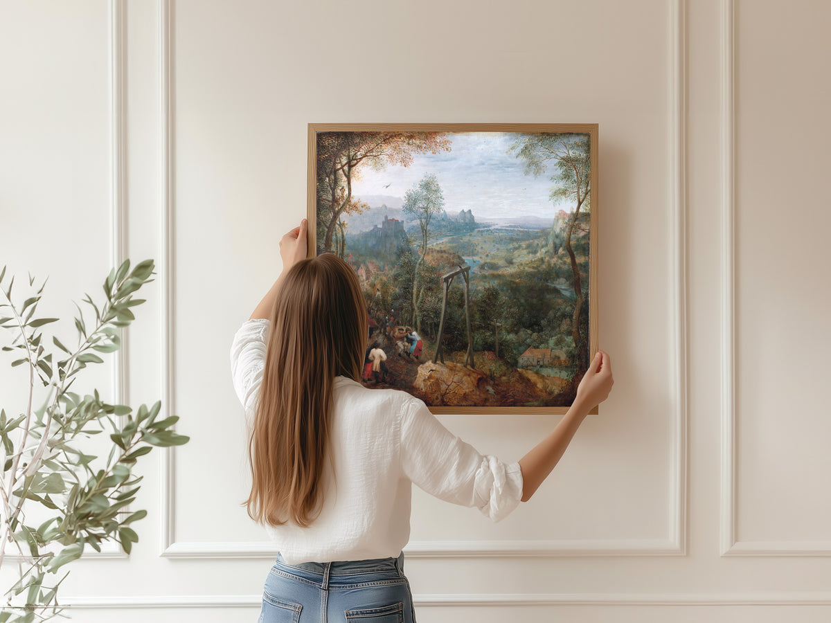 Framed art print of The Magpie on the Gallows by Pieter Bruegel the Elder, hung on a panelled wall