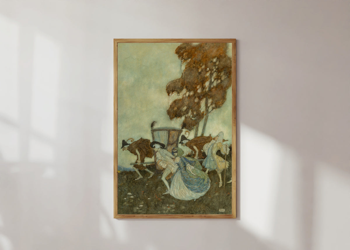 Framed art print of The Masqueraders by Edmund Dulac, in a light wood frame on a sunlit white wall