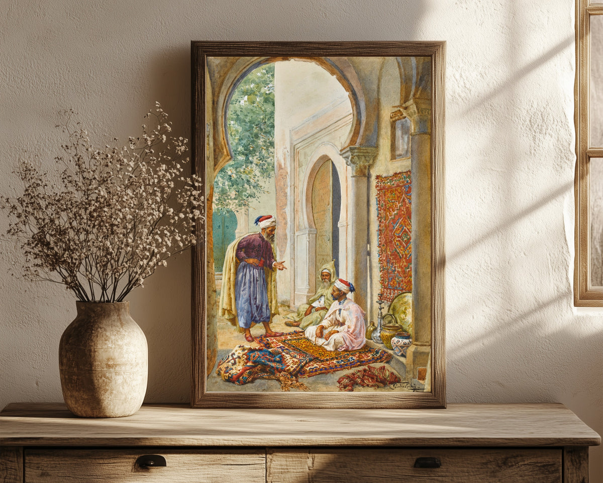 Framed art print of The Merchant by Giulio Rosati, in a dark wood frame leaning on a rustic console beside dried flowers