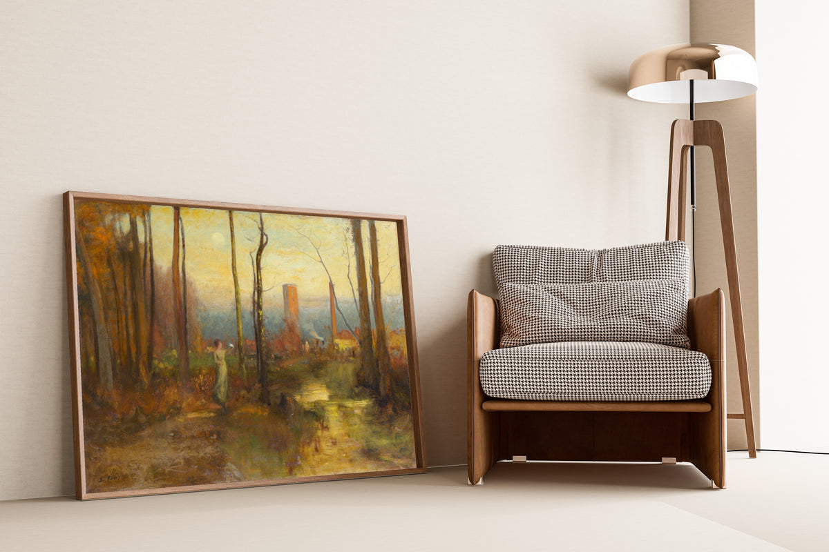The Mill Stream, Montclair, New Jersey by George Inness — framed and leaning against a wall beside an armchair and a floor lamp