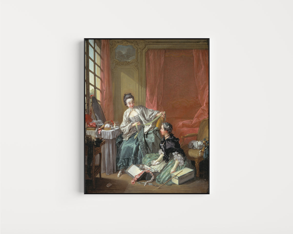 Framed art print of The Milliner by François Boucher, in a slim black frame on a plain white wall
