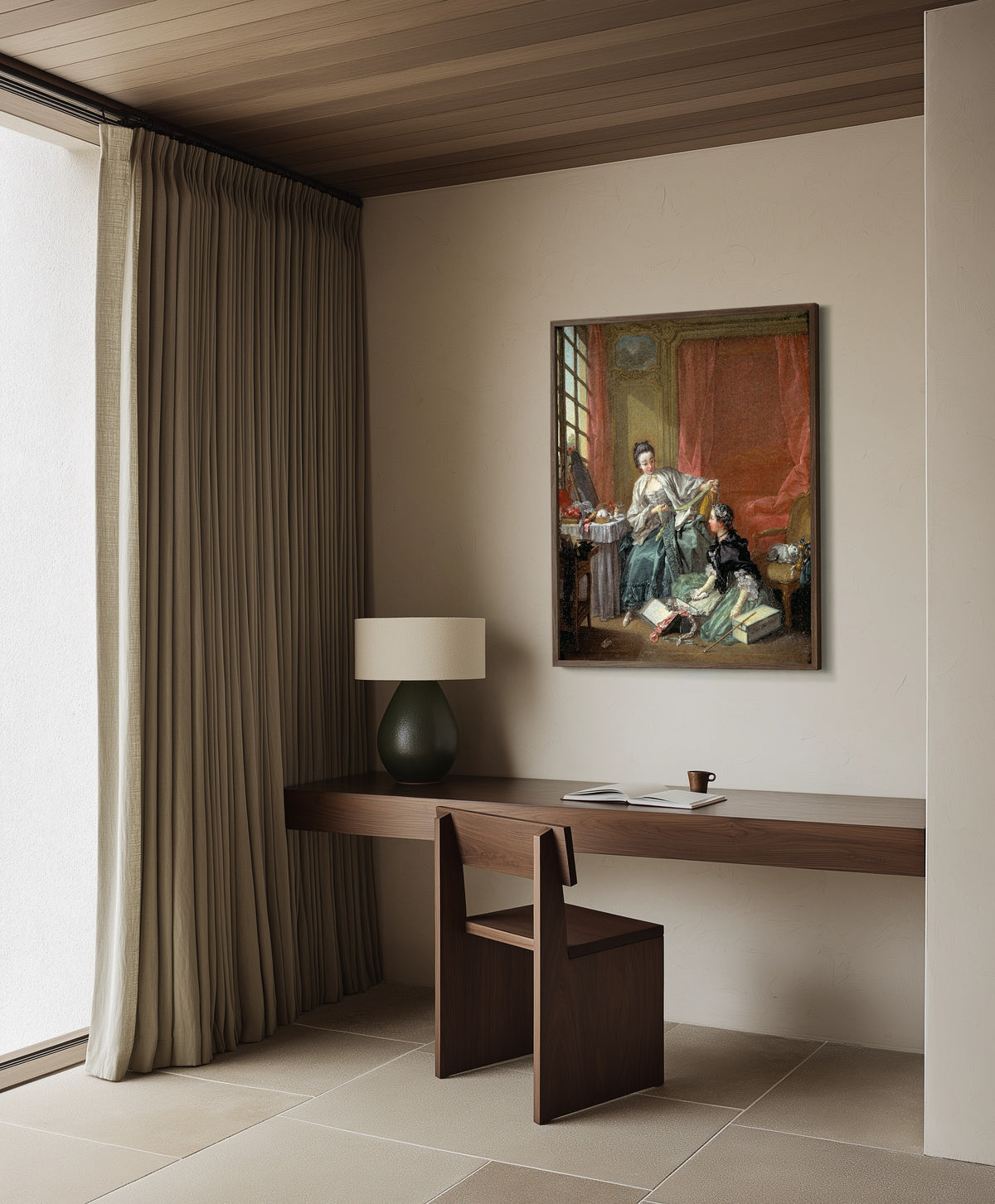 Framed art print of The Milliner by François Boucher, in a dark wood frame on a plaster wall above a walnut desk