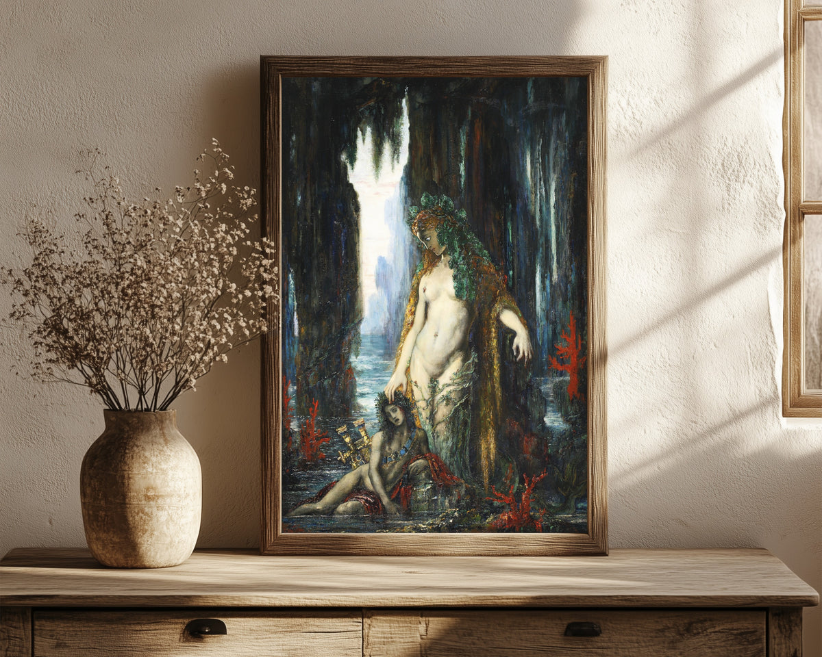 Framed art print of The Poet and the Siren by Gustave Moreau, in a dark wood frame leaning on a rustic console beside dried flowers