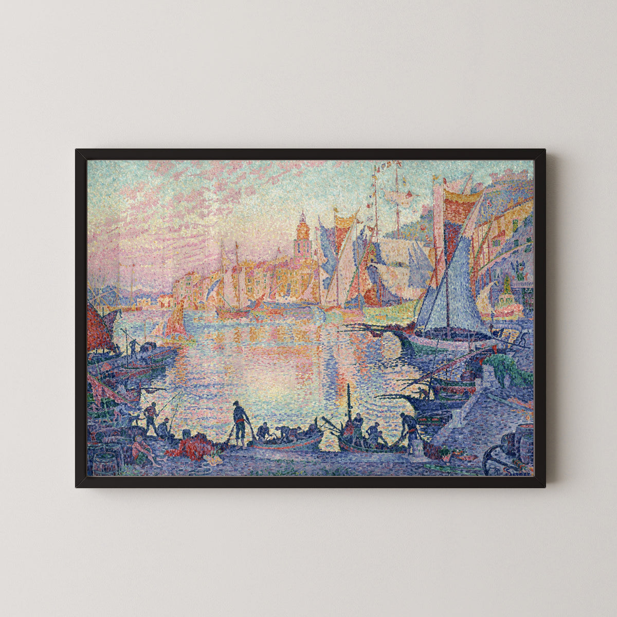 Framed art print of The Port of Saint-Tropez by Paul Signac, in a black frame on a pale wall