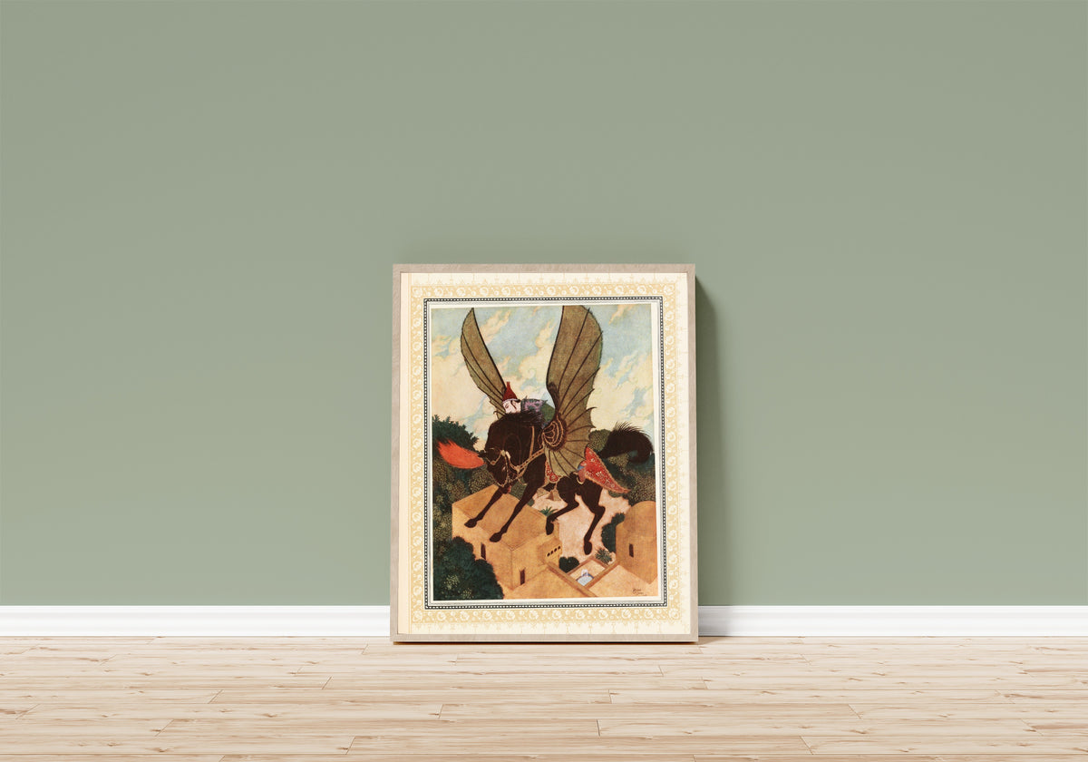 Framed art print of The Prince is taken back to the Golden Palace by… by Edmund Dulac, in a light wood frame leaning on a sage green wall above a wooden floor