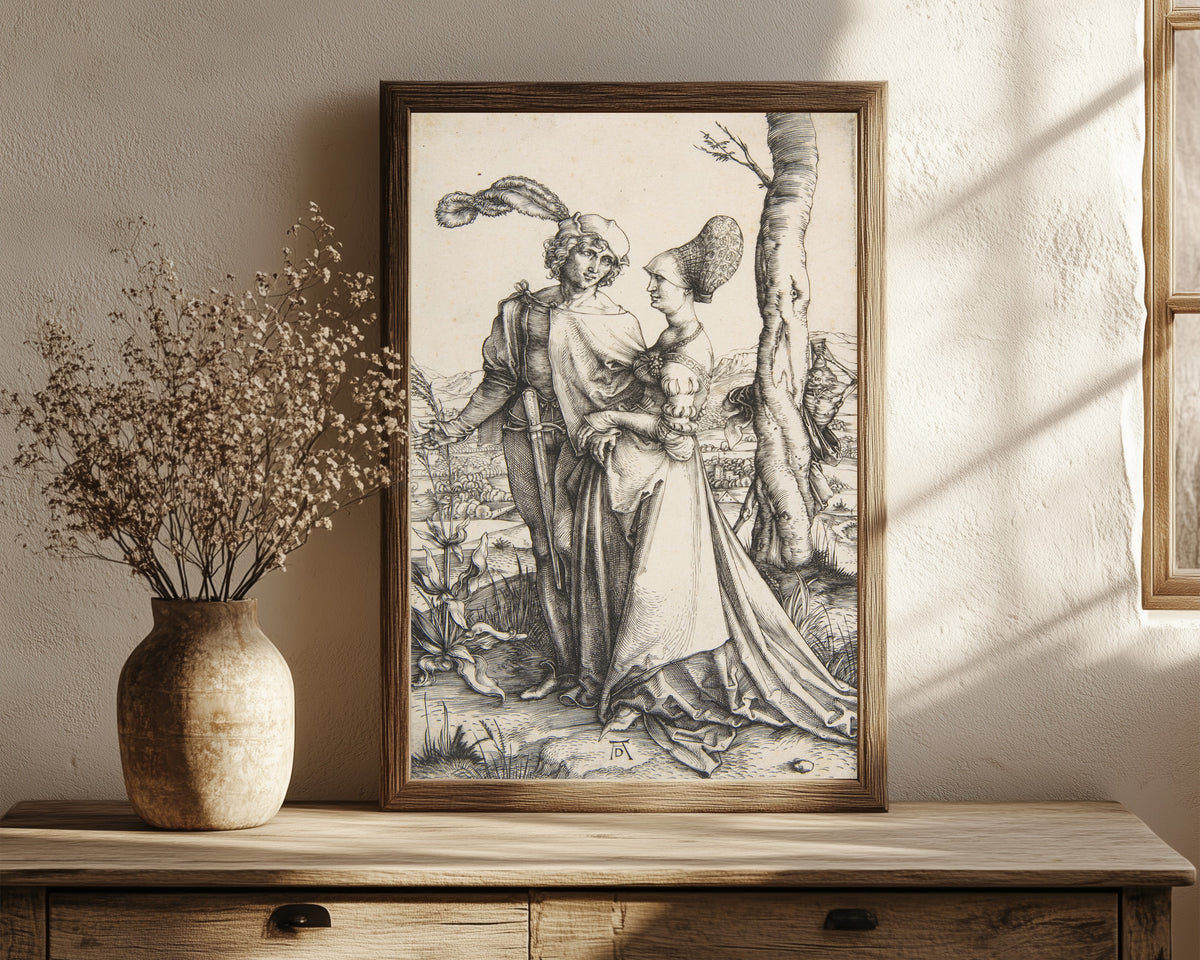 Framed art print of The Promenade by Albrecht Dürer, in a dark wood frame leaning on a rustic console beside dried flowers