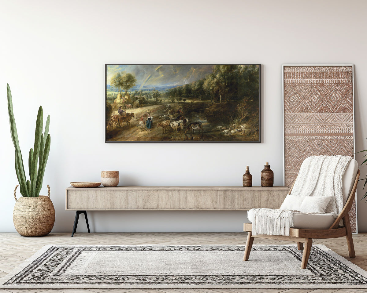 Framed art print of The Rainbow Landscape by Peter Paul Rubens, above a sideboard in a living room
