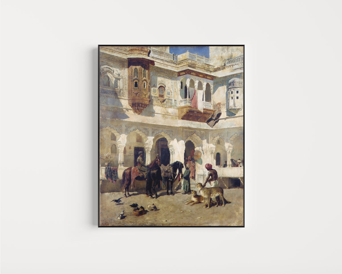Framed art print of The Rajah Starting on a Hunt by Edwin Lord Weeks, in a slim black frame on a plain white wall