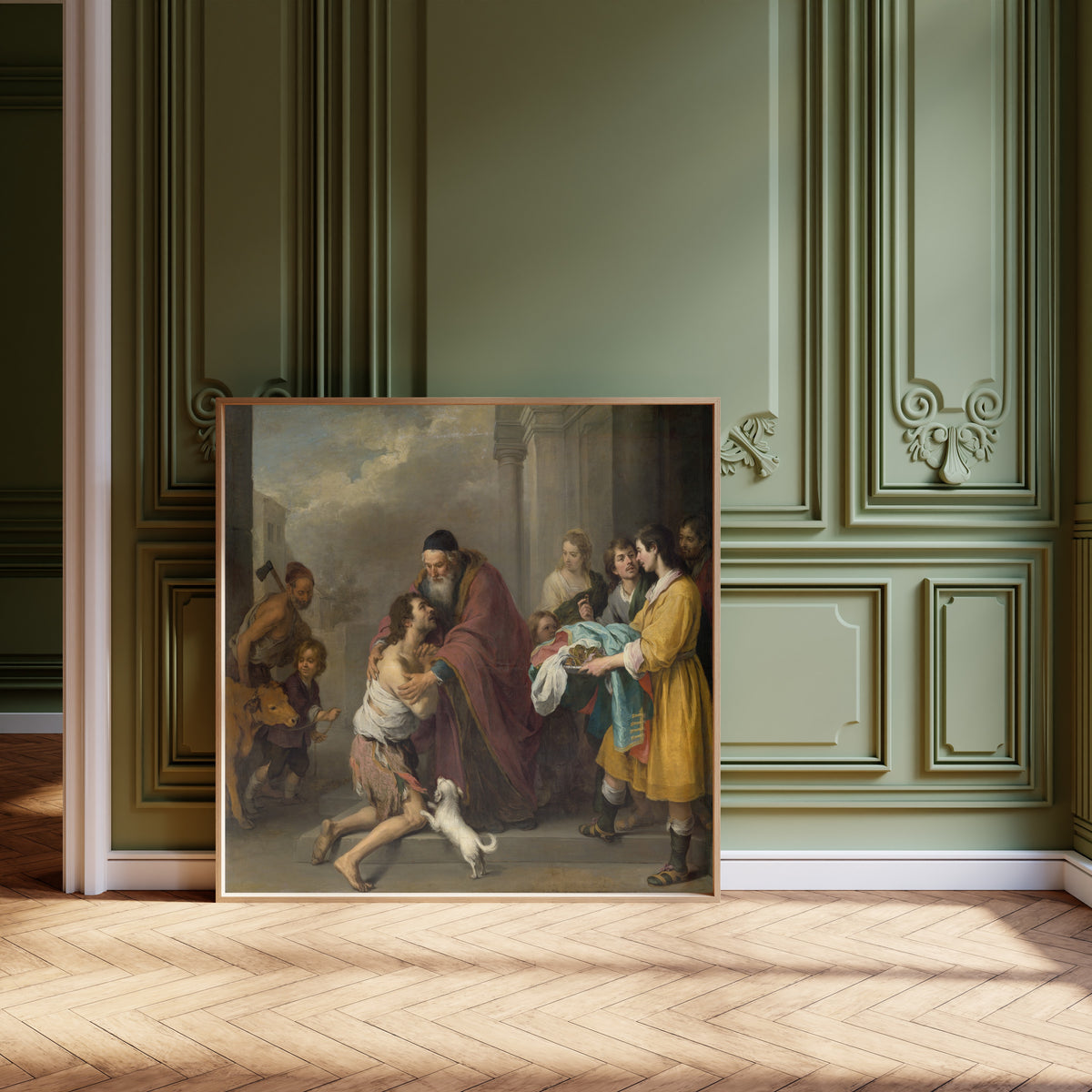 Framed art print of The Return of the Prodigal Son by Bartolomé Esteban Murillo, leaning against olive-green panelling on a herringbone floor
