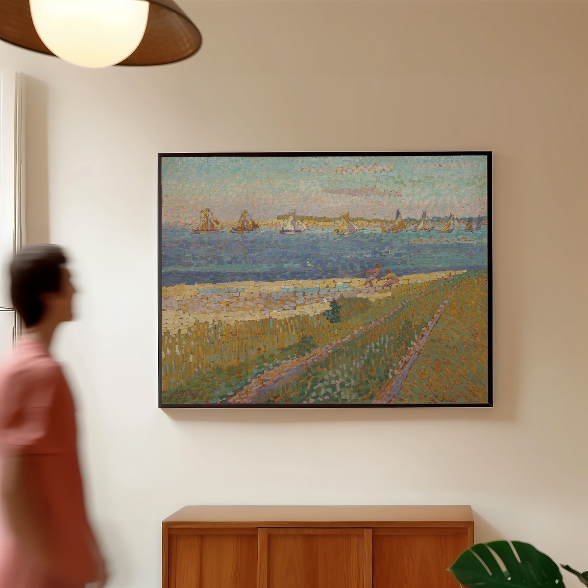 Framed art print of The Schelde near Veere by Jan Toorop, in a slim black frame on a warm wall in a sunlit room