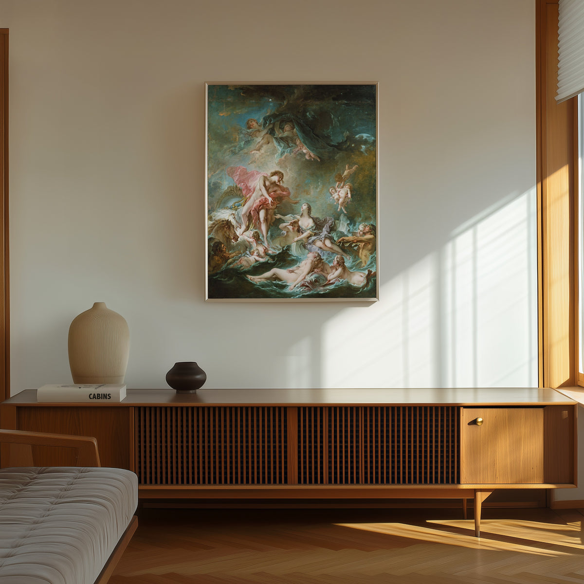 Framed art print of The Setting of the Sun by François Boucher, in a thin light frame on a sunlit wall above a wooden sideboard