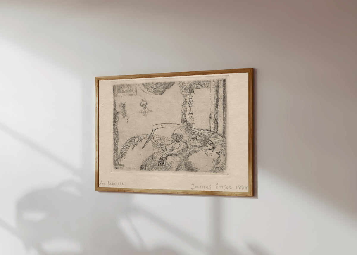 Framed art print of The Seven Deadly Sins: Lust by James Ensor, in a light wood frame on a sunlit white wall, seen at a slight angle