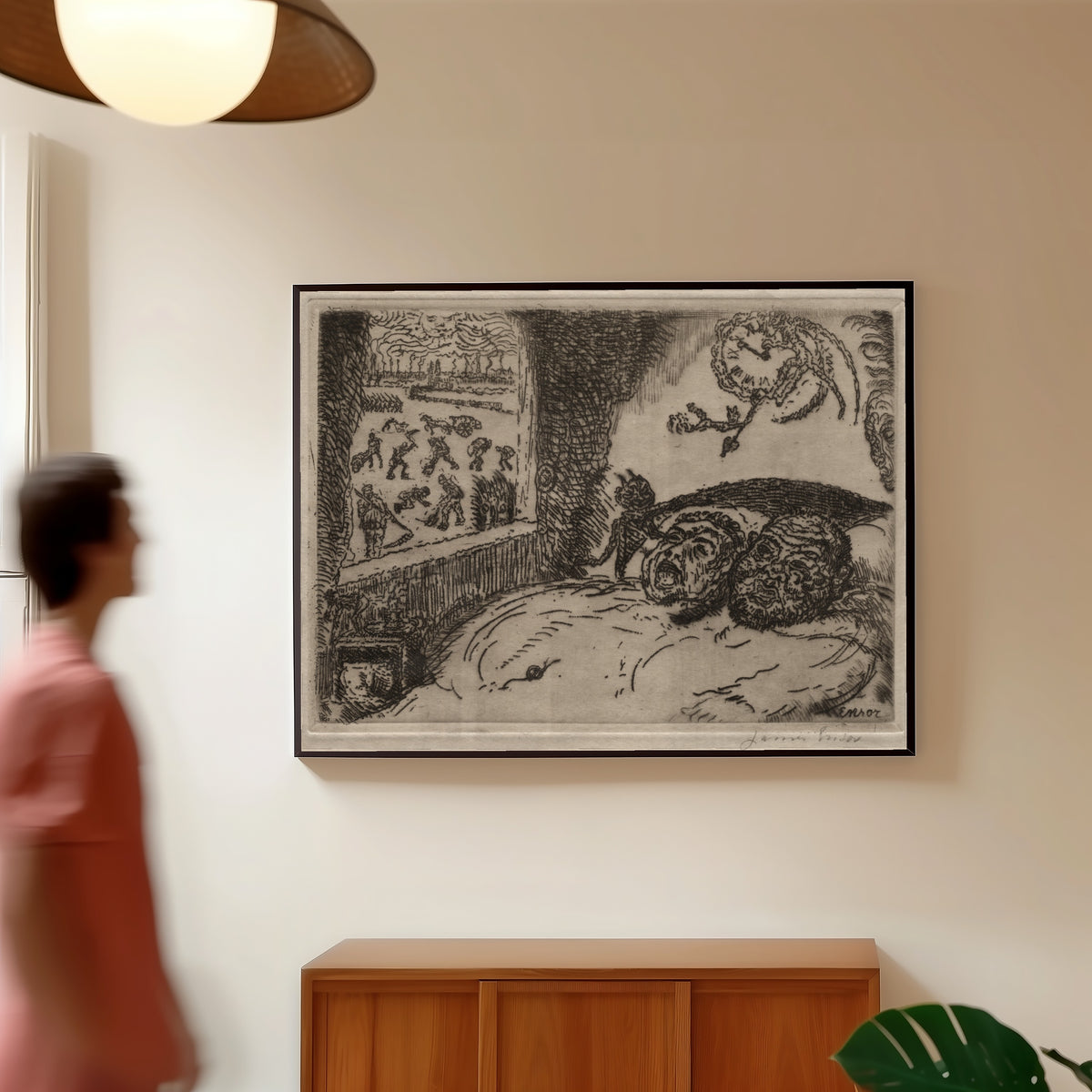 Framed art print of The Seven Deadly Sins: Sloth by James Ensor, in a slim black frame on a warm wall in a sunlit room