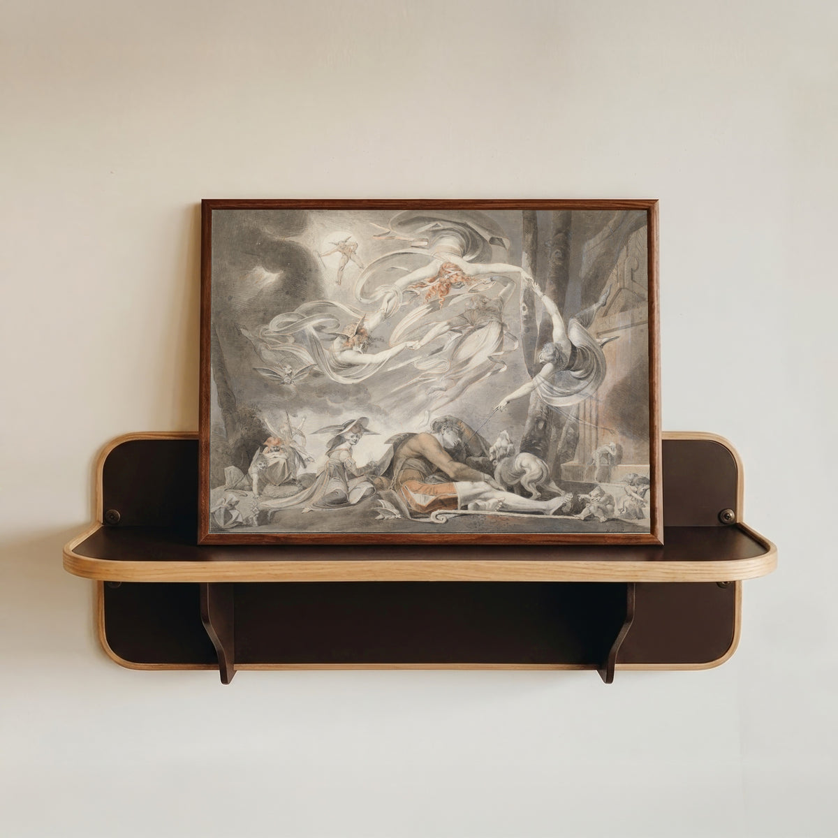 Framed art print of The Shepherd's Dream by Henry Fuseli, in a dark wood frame resting on a wall shelf