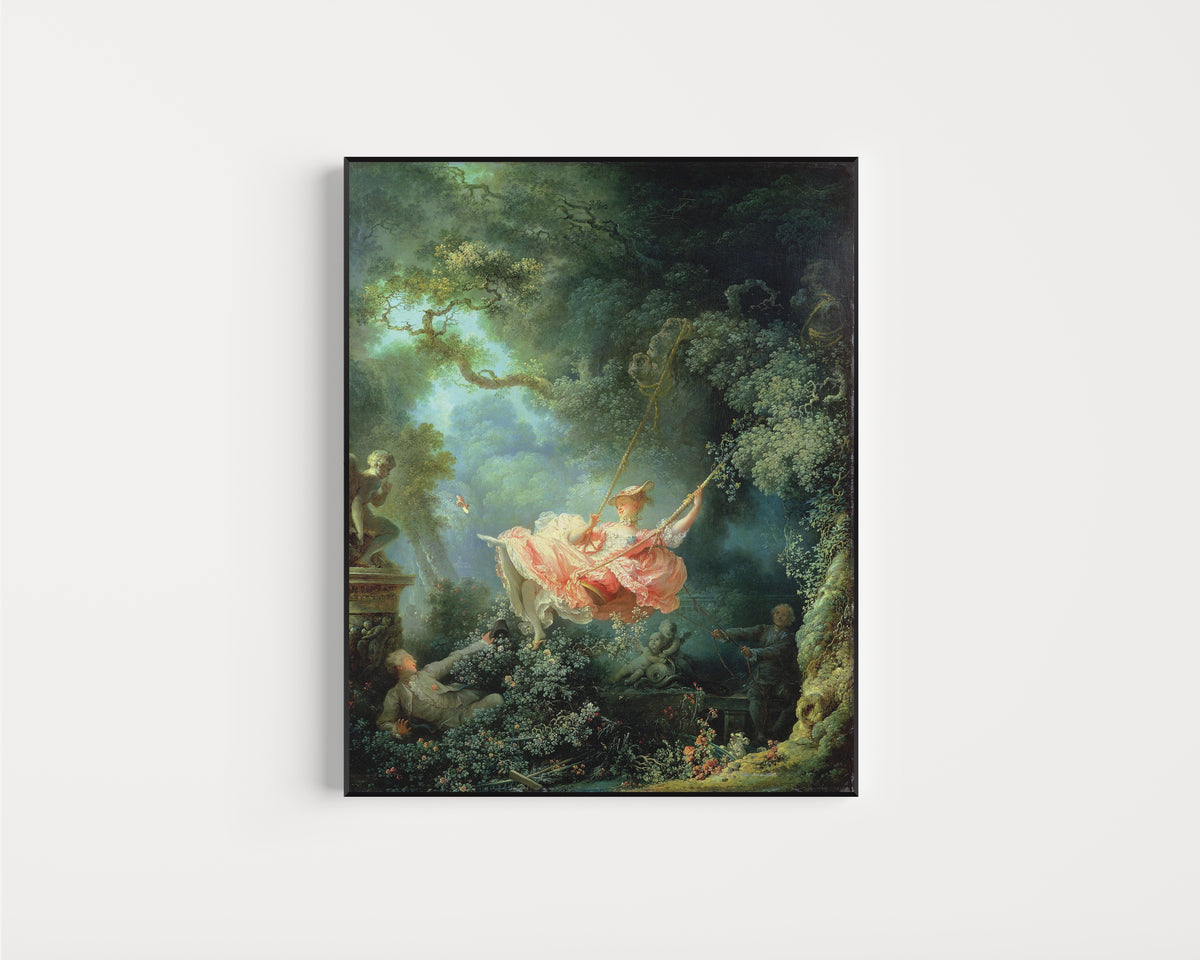 Framed art print of The Swing by Jean-Honoré Fragonard, in a slim black frame on a plain white wall