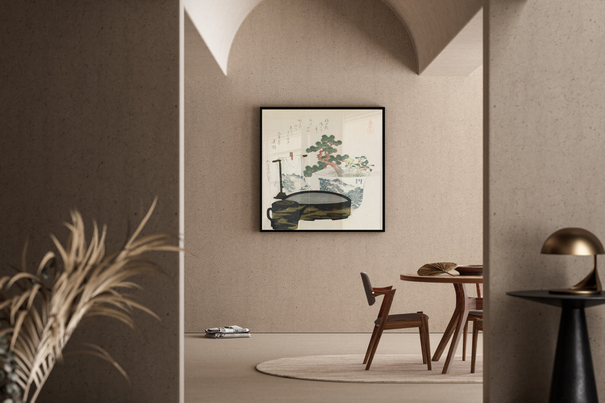 Framed art print of The Talisman by Katsushika Hokusai, in a sunlit dining corner