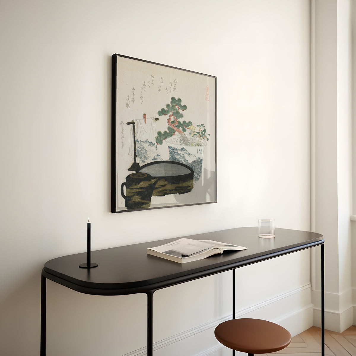 Framed art print of The Talisman by Katsushika Hokusai, above a slim black console table