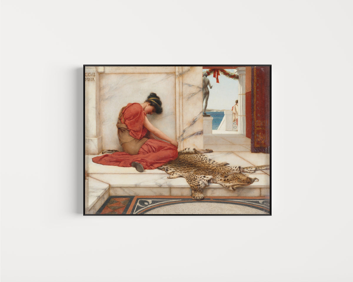 Framed art print of The Tiff by John William Godward, in a slim black frame on a plain white wall