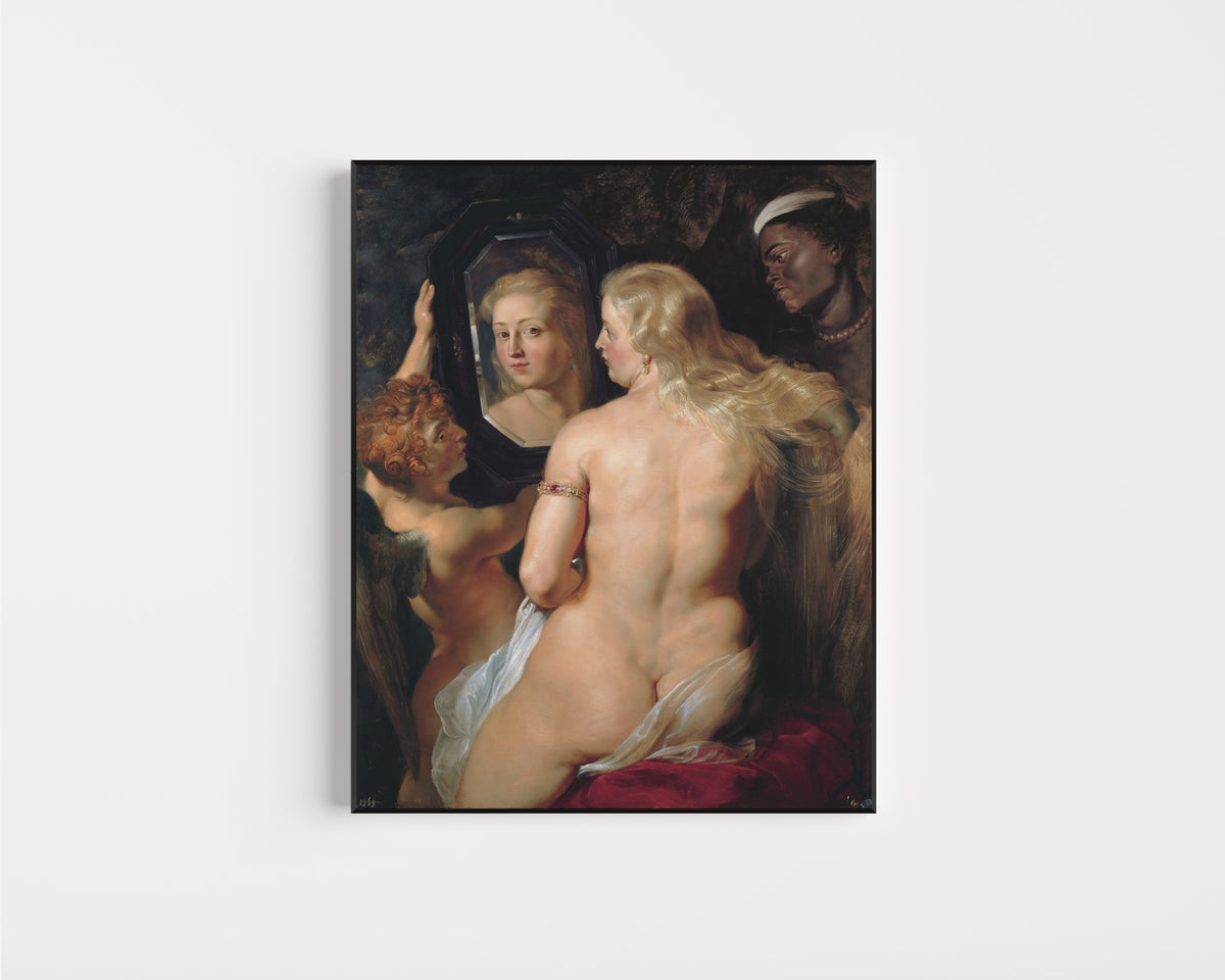 Framed art print of The Toilet of Venus by Peter Paul Rubens, in a slim black frame on a plain white wall