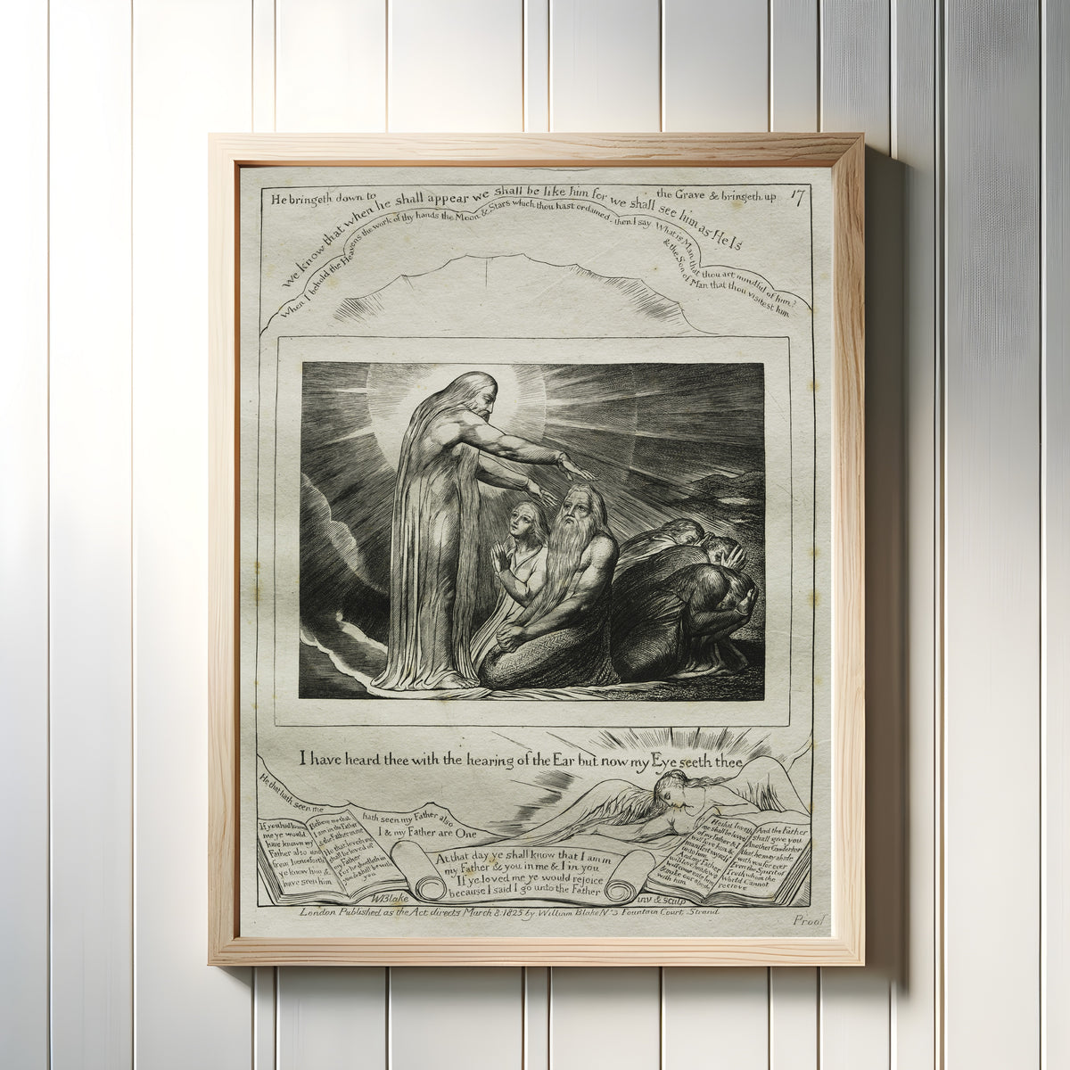 Framed art print of The Vision of God (Book of Job, Plate 17) by William Blake, in a light wood frame on a white panelled wall