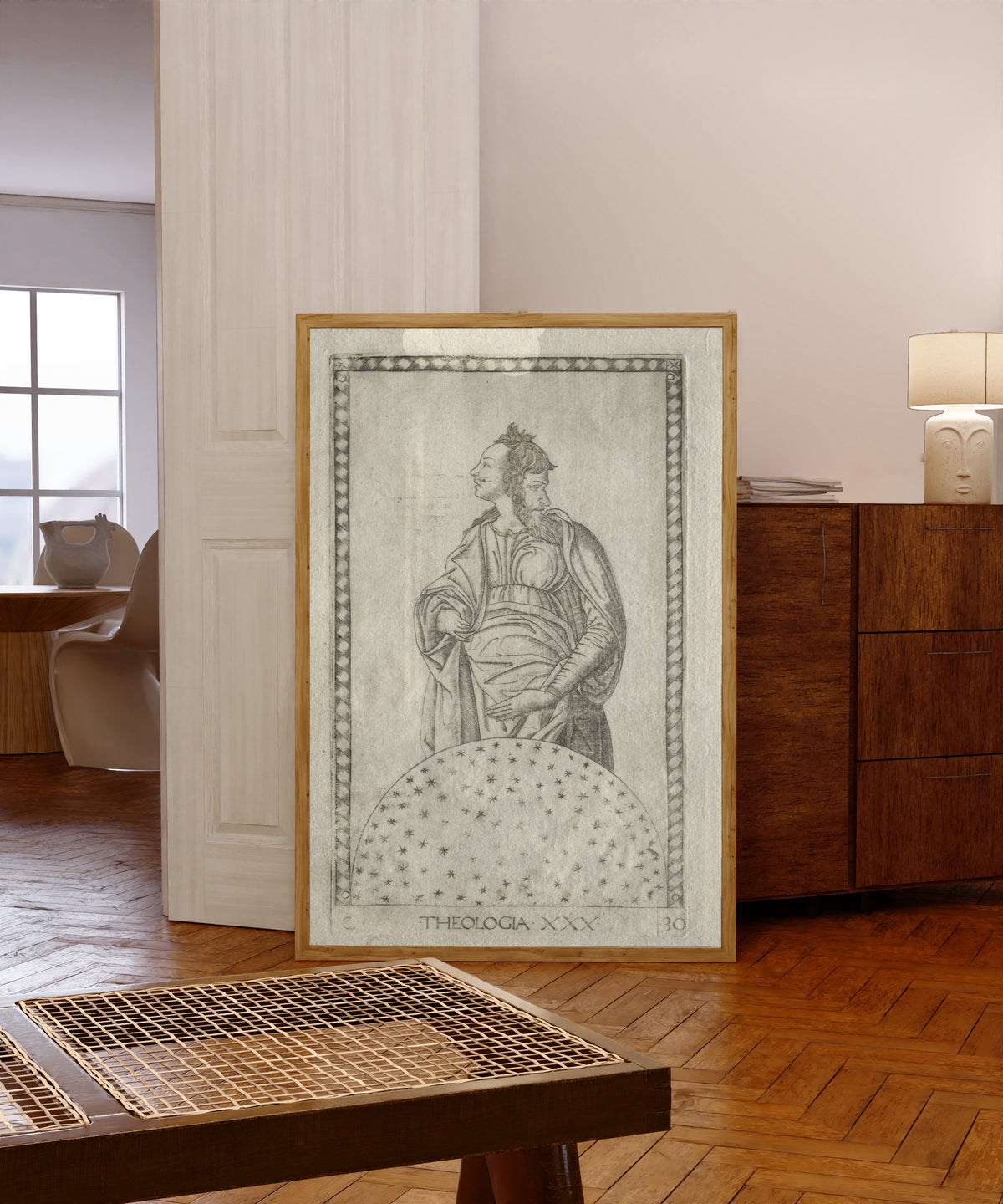 Framed art print of Theology (from the Tarocchi, Series… by Master of the E-Series Tarocchi, in a light wood frame leaning in a warm room with a parquet floor