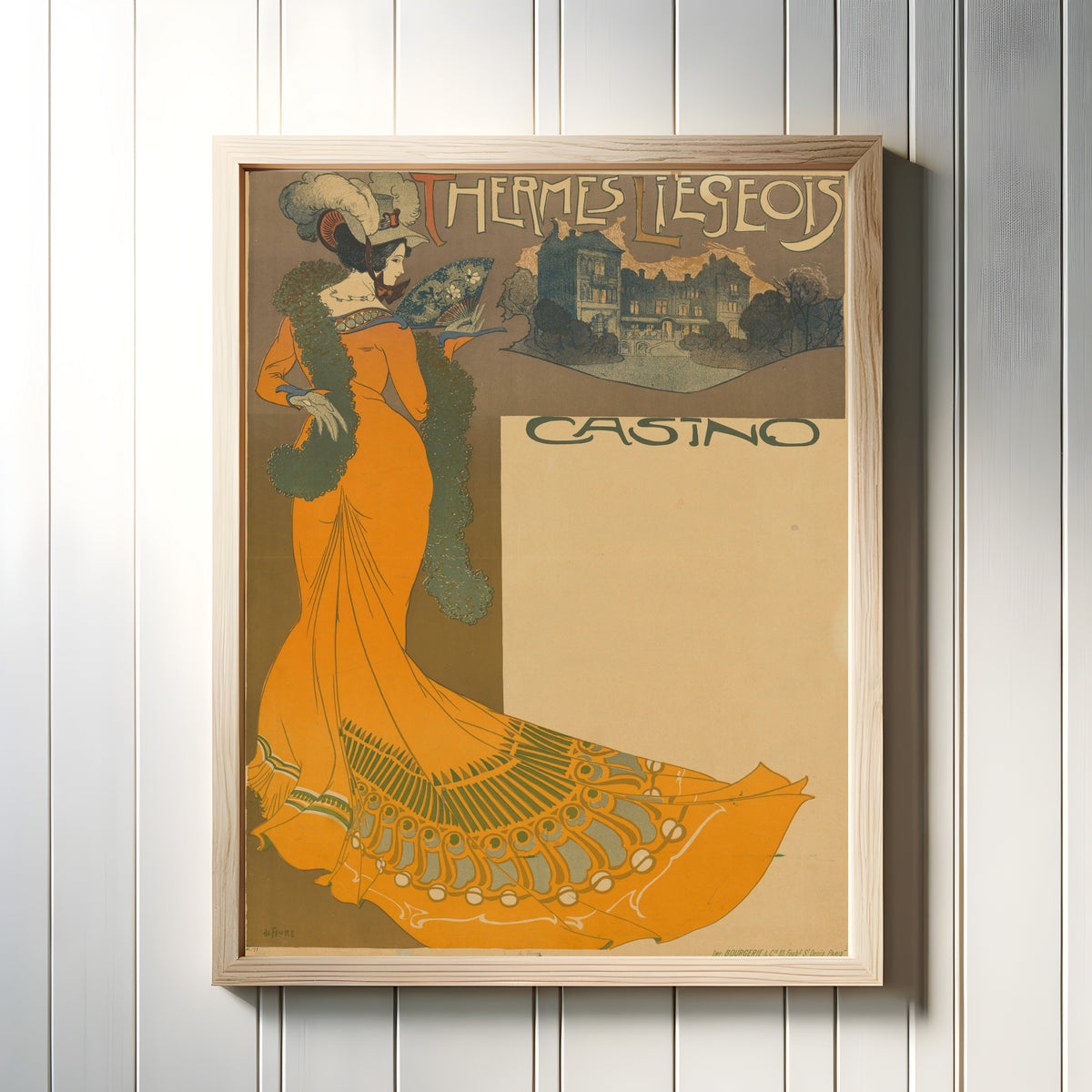 Framed art print of Thermes Liégeois Casino by Georges de Feure, in a light wood frame on a white panelled wall