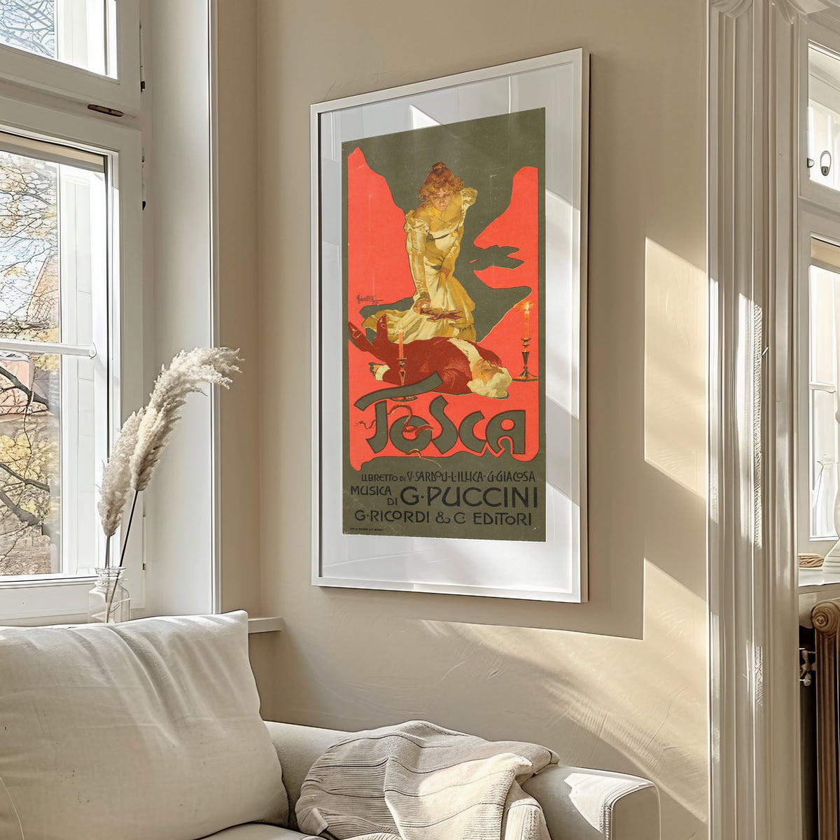 Framed art print of Tosca by Adolfo Hohenstein, in a sunlit living room above a sofa