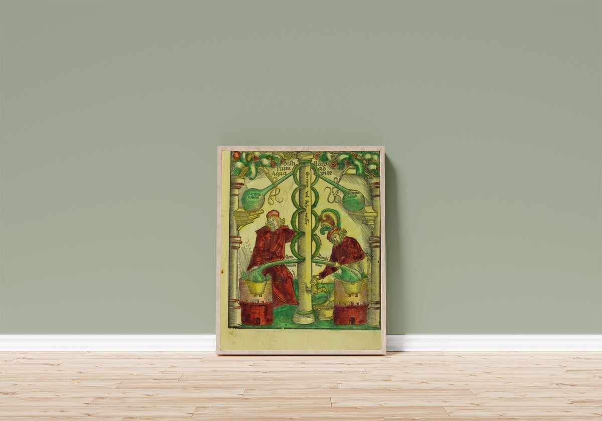 Framed art print of Two Distillers at the Twin Column (Liber… by Hieronymus Brunschwig, in a light wood frame leaning on a sage green wall above a wooden floor