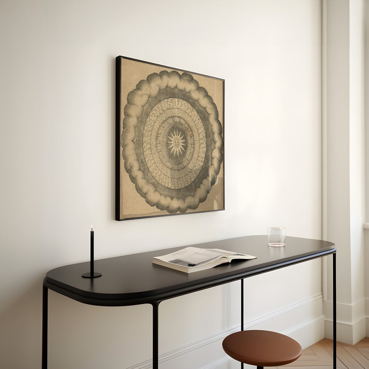 Framed art print of Utriusque Cosmi, the Primordial Plate on Page 43 by Robert Fludd, above a slim black console table