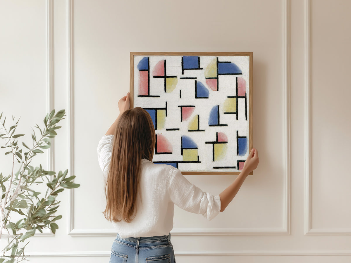 Framed art print of Variation on Composition XIII by Theo van Doesburg, hung on a panelled wall