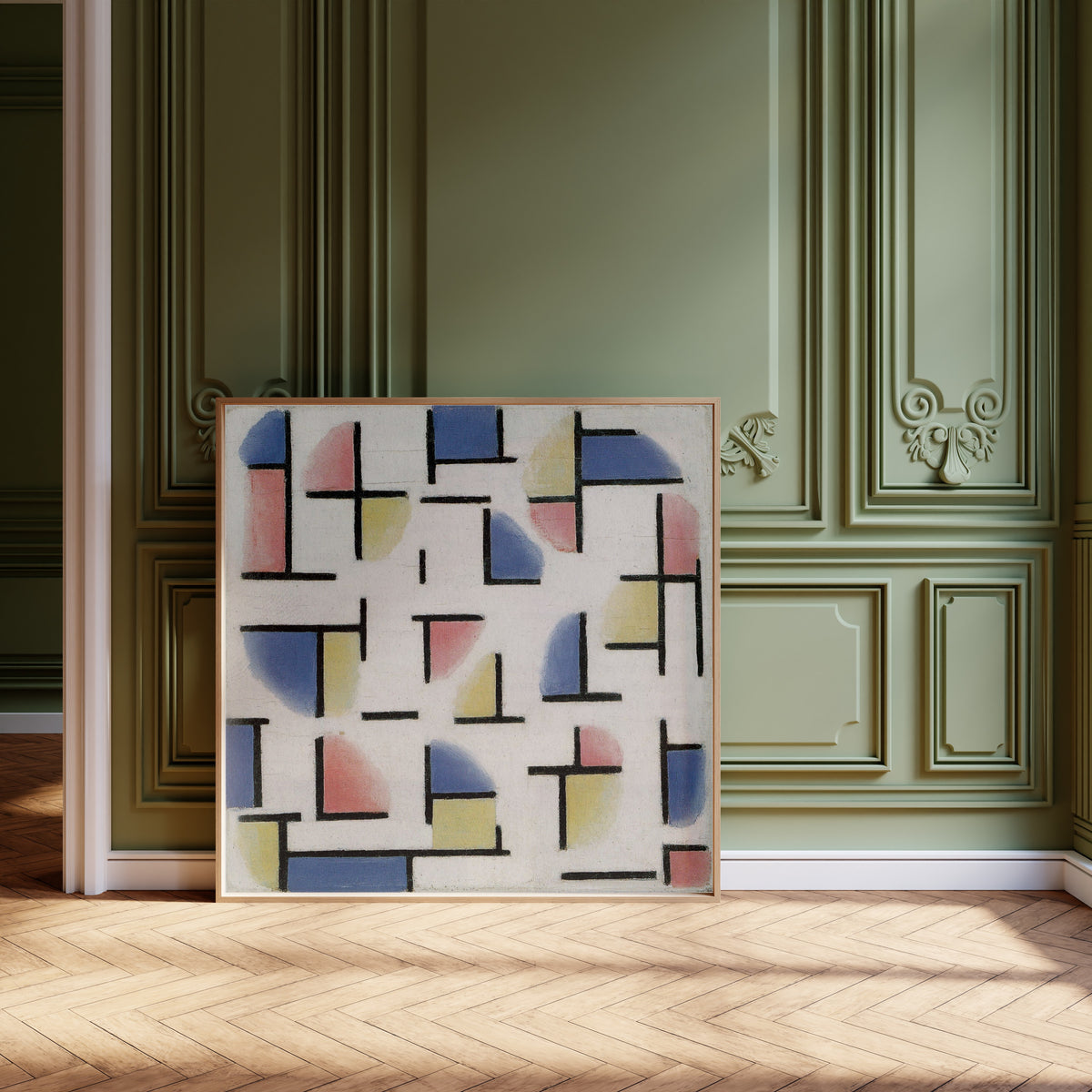 Framed art print of Variation on Composition XIII by Theo van Doesburg, leaning against olive-green panelling on a herringbone floor