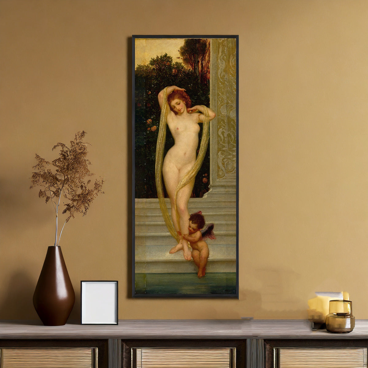 Framed art print of Venus and Cupid by Frederic Leighton, on an ochre wall above a console table