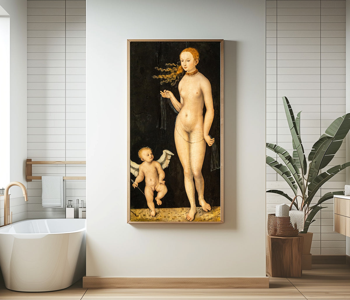 Framed art print of Venus and Cupid by Lucas Cranach the Elder, in a bathroom beside a freestanding tub