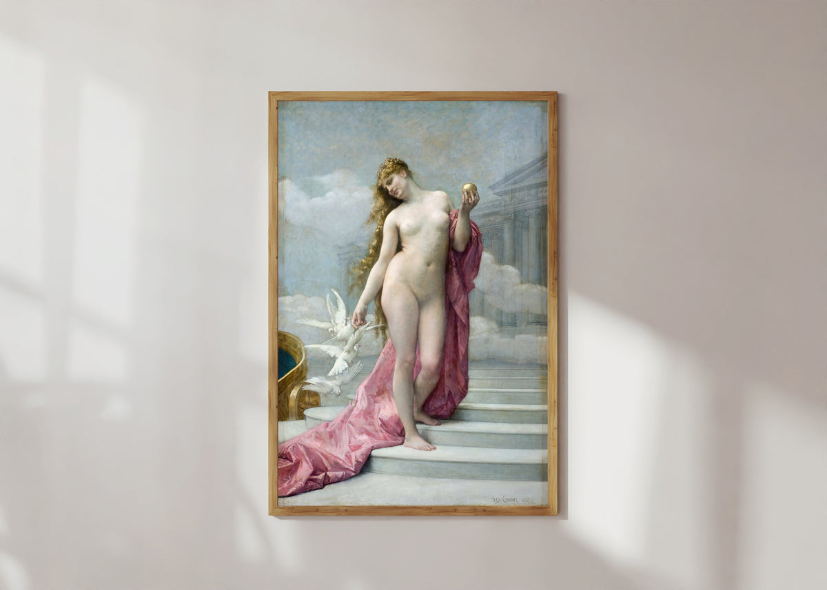 Framed art print of Venus by Alexandre Cabanel, in a light wood frame on a sunlit white wall