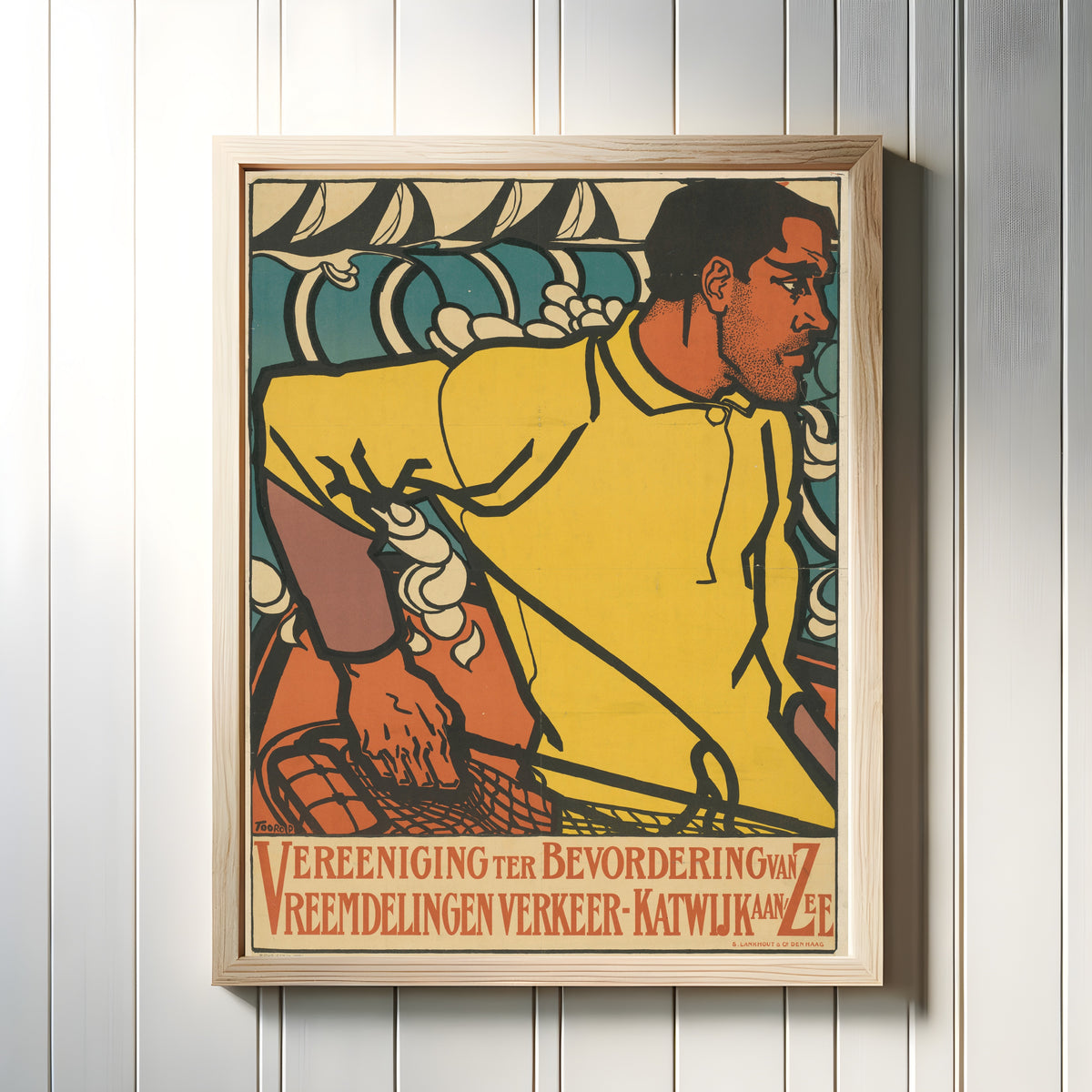 Framed art print of Vereeniging ter Bevordering van Vreemdelingenverkeer-Katwijk aan Zee by Jan Toorop, in a light wood frame on a white panelled wall