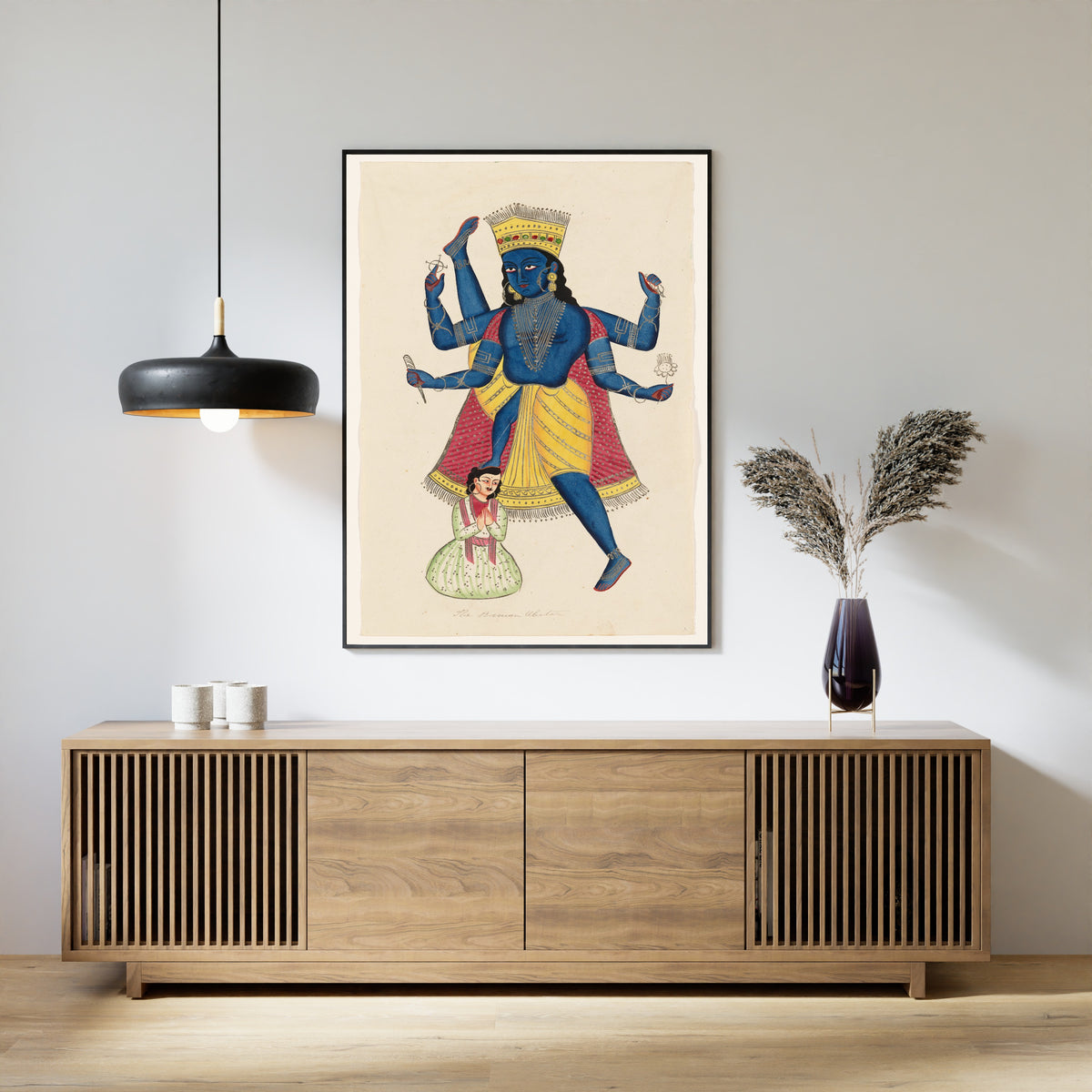 Framed art print of Vishnu as Vamana defeating King Mahabali by Kalighat painter, above a slatted wood sideboard